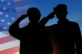 U.S. Veterans saluting flag